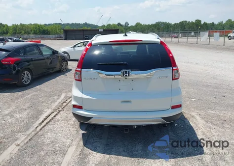 2016 Honda Cr-V Touring z USA, uszkodzony, nr VIN 5J6RM4H95GL118070